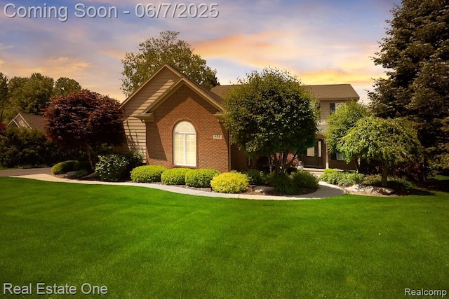 468 Orchard Ridge Dr, Lake Orion, MI 48362 - view of front of home with a front yard and brick siding