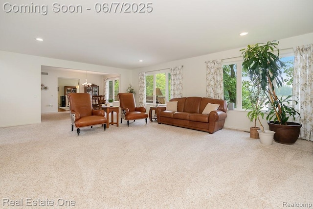 468 Orchard Ridge Dr, Lake Orion, MI 48362 - carpeted living area with a chandelier and recessed lighting