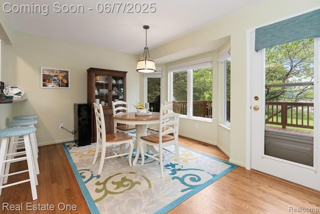 468 Orchard Ridge Dr, Lake Orion, MI 48362 - dining space with healthy amount of natural light, wood finished floors, and baseboards