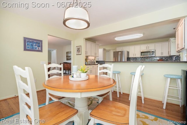 468 Orchard Ridge Dr, Lake Orion, MI 48362 - dining room with light wood-style floors