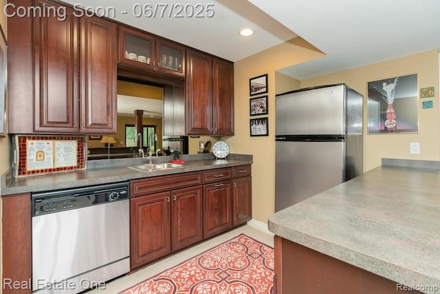 468 Orchard Ridge Dr, Lake Orion, MI 48362 - kitchen with stainless steel appliances, a sink, glass insert cabinets, and recessed lighting