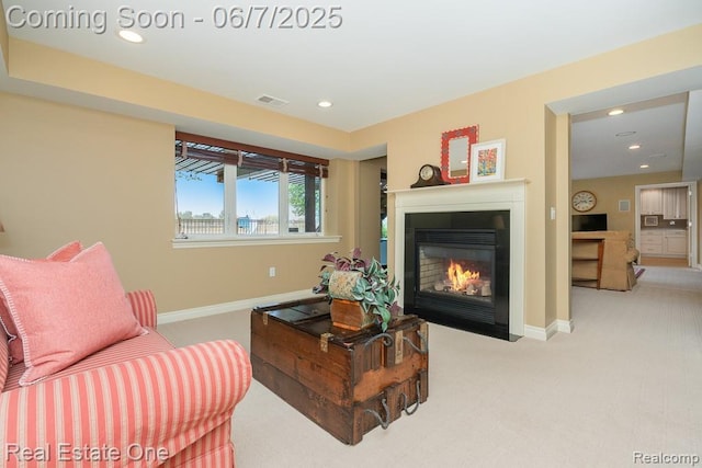 468 Orchard Ridge Dr, Lake Orion, MI 48362 - living area with carpet floors, a fireplace with flush hearth, baseboards, and recessed lighting