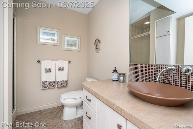 468 Orchard Ridge Dr, Lake Orion, MI 48362 - bathroom with decorative backsplash, a stall shower, baseboards, and toilet