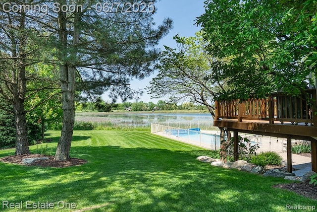 468 Orchard Ridge Dr, Lake Orion, MI 48362 - view of green lawn with a deck with water view