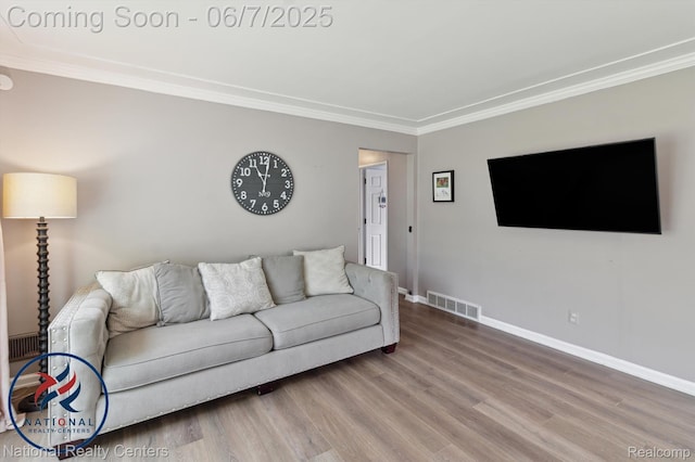 9036 Nathaline, Redford, MI 48239 - living room featuring crown molding, baseboards, and wood finished floors