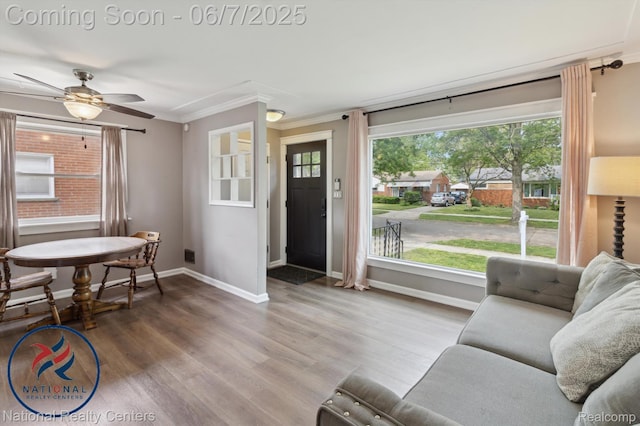 9036 Nathaline, Redford, MI 48239 - living room with crown molding, baseboards, wood finished floors, and ceiling fan