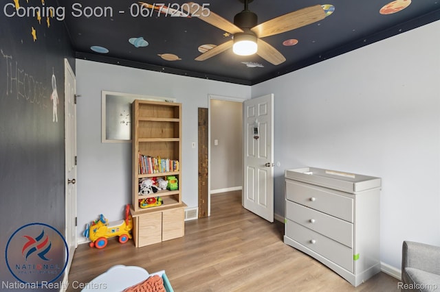 9036 Nathaline, Redford, MI 48239 - playroom with wood finished floors, ceiling fan, and baseboards