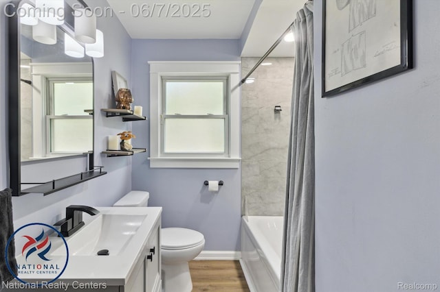 9036 Nathaline, Redford, MI 48239 - bathroom featuring toilet, vanity, wood finished floors, and plenty of natural light