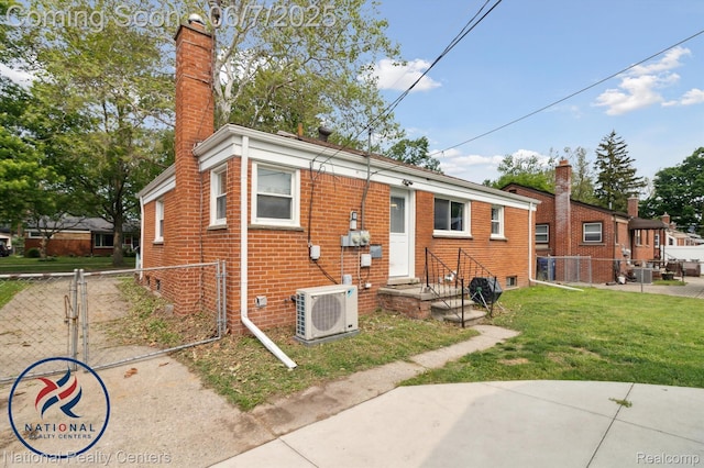 9036 Nathaline, Redford, MI 48239 - view of front of property with ac unit, brick siding, a chimney, and a gate