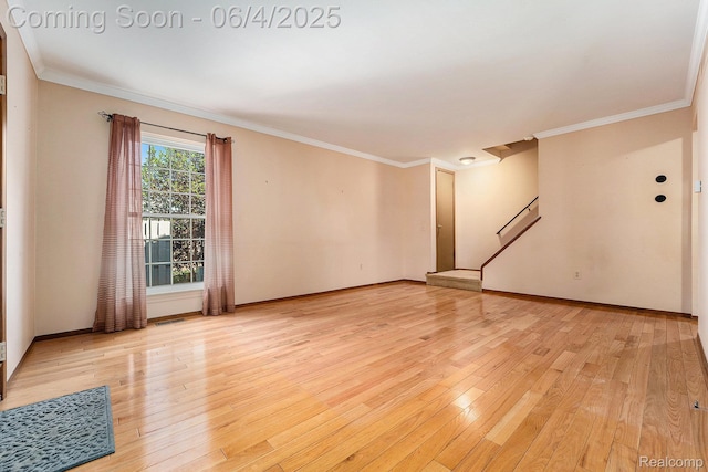 35638 Stillmeadow Ln, Clinton Township, MI 48035 - empty room featuring light wood-style floors, ornamental molding, and baseboards