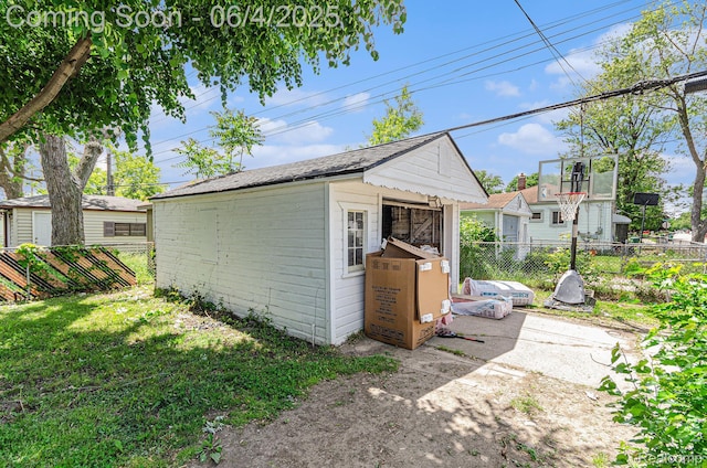 24309 Tuscany Ave, Eastpointe, MI 48021 - view of side of home featuring an outdoor structure