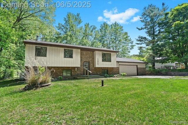 13041 Big Lake Rd, Davisburg, MI 48350 - split foyer home featuring brick siding and a front lawn