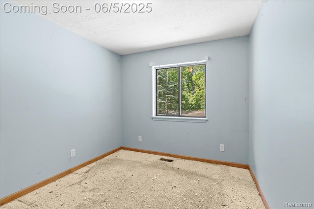 13041 Big Lake Rd, Davisburg, MI 48350 - spare room featuring baseboards