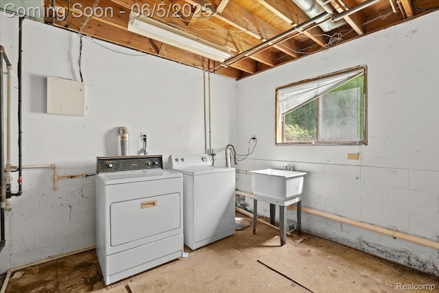 13041 Big Lake Rd, Davisburg, MI 48350 - washroom with washing machine and dryer and concrete block wall