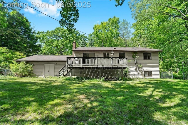 13041 Big Lake Rd, Davisburg, MI 48350 - back of house with a deck, stairs, and a chimney