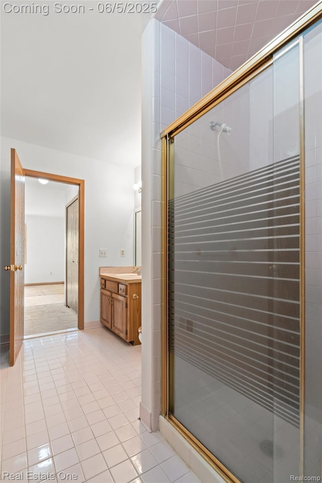 2343 Heritage Pointe Dr Unit 29, Sterling Heights, MI 48314 - full bathroom with vanity, tile patterned flooring, and a stall shower