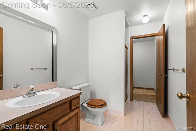 2343 Heritage Pointe Dr Unit 29, Sterling Heights, MI 48314 - full bathroom featuring toilet, vanity, a stall shower, and tile patterned flooring