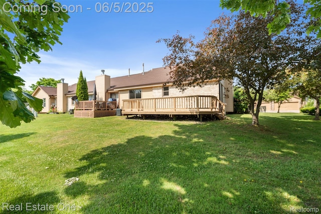 2343 Heritage Pointe Dr Unit 29, Sterling Heights, MI 48314 - view of green lawn featuring a wooden deck