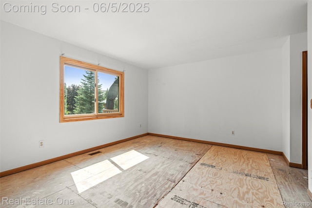 2343 Heritage Pointe Dr Unit 29, Sterling Heights, MI 48314 - spare room with baseboards