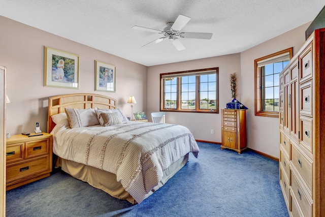 3547 Sand Bar Ct, Muskegon, MI 49441 - bedroom with carpet floors, multiple windows, baseboards, and a ceiling fan