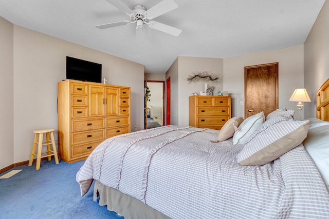 3547 Sand Bar Ct, Muskegon, MI 49441 - carpeted bedroom with ceiling fan and baseboards