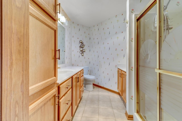 3547 Sand Bar Ct, Muskegon, MI 49441 - bathroom featuring vanity, toilet, wallpapered walls, a shower stall, and tile patterned floors