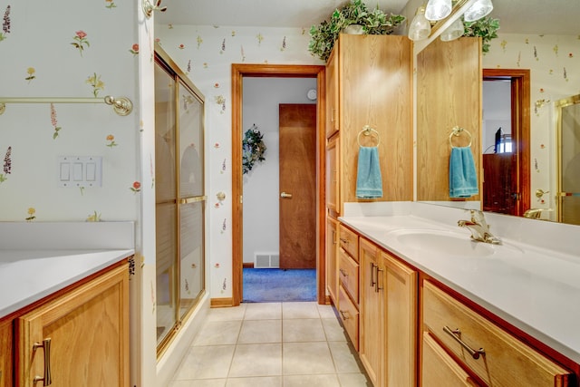 3547 Sand Bar Ct, Muskegon, MI 49441 - bathroom featuring vanity, a stall shower, and tile patterned flooring