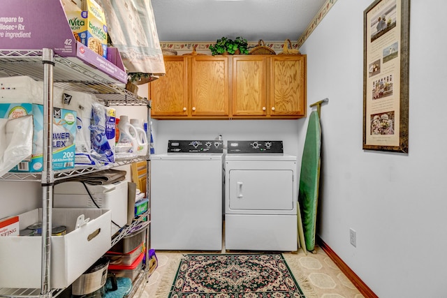 3547 Sand Bar Ct, Muskegon, MI 49441 - laundry room featuring independent washer and dryer and cabinet space