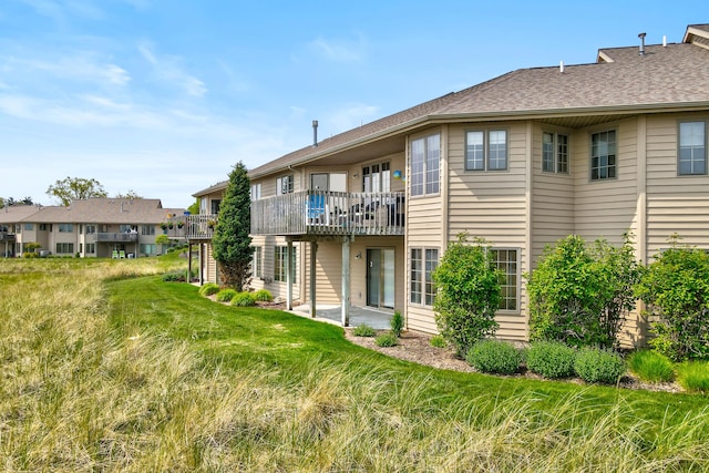 3547 Sand Bar Ct, Muskegon, MI 49441 - rear view of property featuring a balcony and a residential view