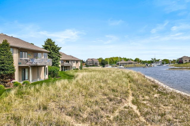 3547 Sand Bar Ct, Muskegon, MI 49441 - view of yard with a water view and a residential view