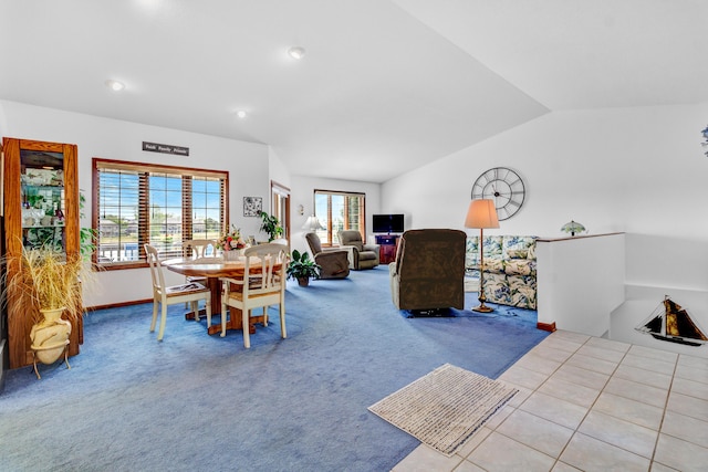 3547 Sand Bar Ct, Muskegon, MI 49441 - carpeted dining area with lofted ceiling, recessed lighting, and baseboards