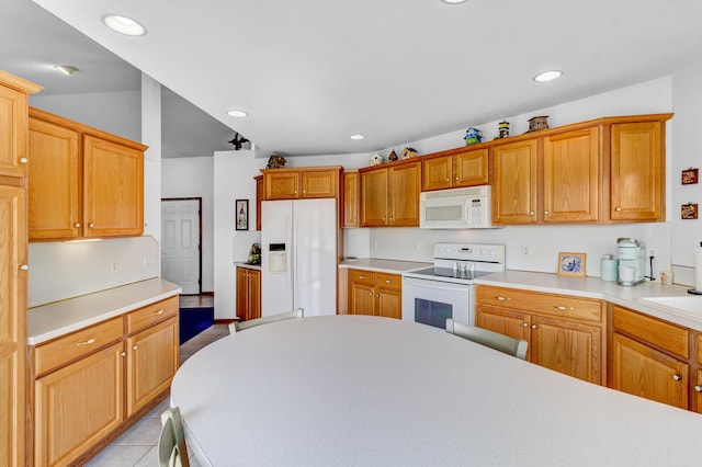 3547 Sand Bar Ct, Muskegon, MI 49441 - kitchen featuring white appliances, light countertops, recessed lighting, and light tile patterned floors