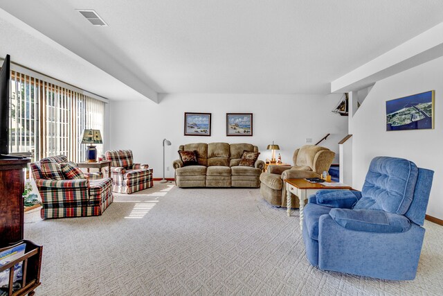 3547 Sand Bar Ct, Muskegon, MI 49441 - living area featuring carpet floors, stairs, and baseboards