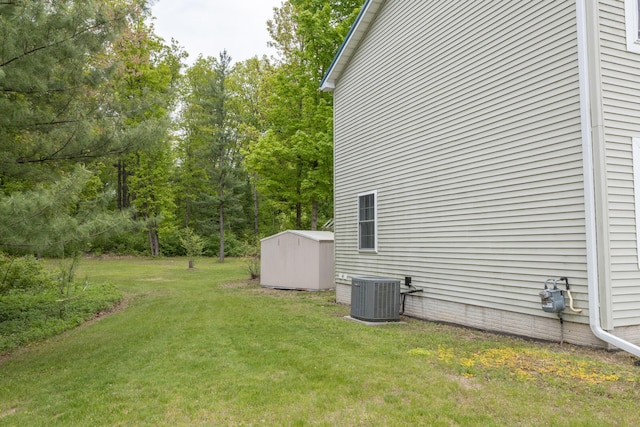 18735 Jefferson Rd, Morley, MI 49336 - view of grassy yard with central AC