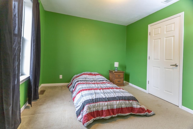 18735 Jefferson Rd, Morley, MI 49336 - carpeted bedroom featuring baseboards