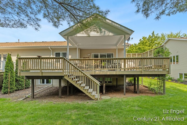 458 Amity St, Douglas, MI 49406 - back of house featuring a wooden deck, stairway, and a lawn