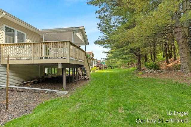 458 Amity St, Douglas, MI 49406 - view of green lawn with stairway and a wooden deck