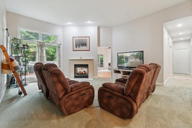 8883 Dixie Hwy, Birch Run, MI 48415 - carpeted living room with a multi sided fireplace and recessed lighting