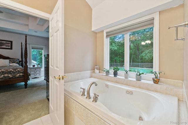 8883 Dixie Hwy, Birch Run, MI 48415 - bathroom with a jetted tub, plenty of natural light, and ensuite bath