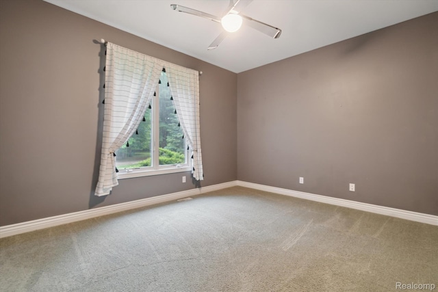 8883 Dixie Hwy, Birch Run, MI 48415 - unfurnished room featuring carpet, a ceiling fan, and lofted ceiling