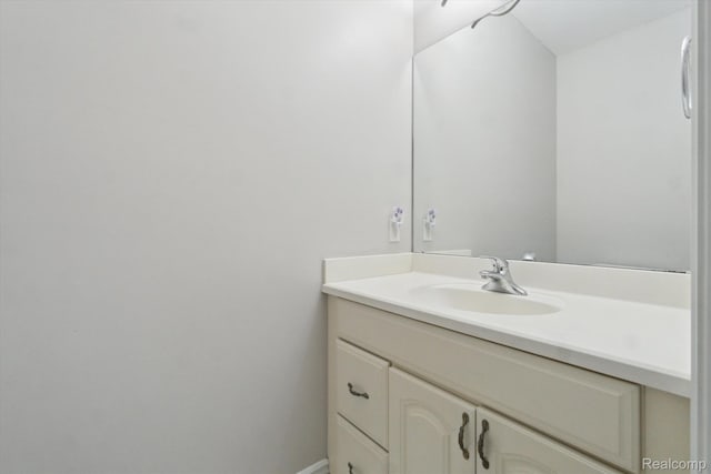 8883 Dixie Hwy, Birch Run, MI 48415 - bathroom with vanity and baseboards