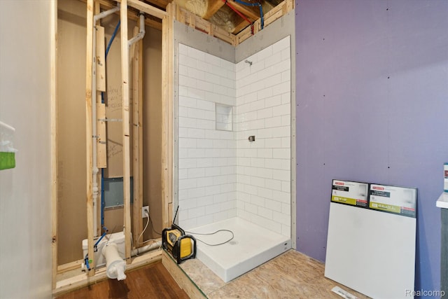 8883 Dixie Hwy, Birch Run, MI 48415 - bathroom with a stall shower and wood finished floors