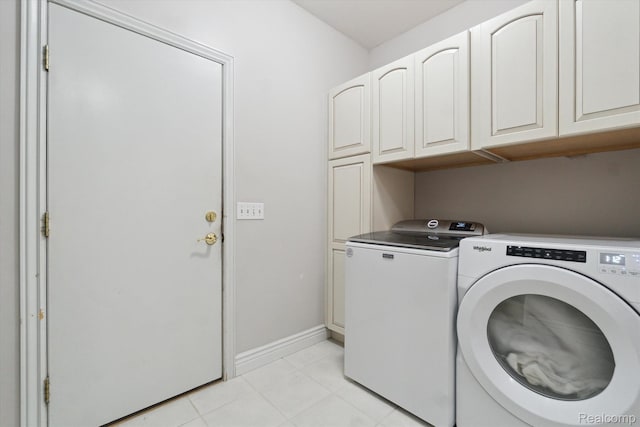 8883 Dixie Hwy, Birch Run, MI 48415 - laundry area with cabinet space and separate washer and dryer
