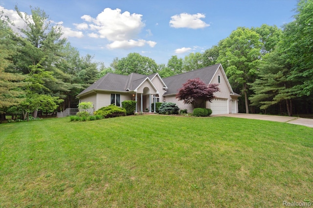 8883 Dixie Hwy, Birch Run, MI 48415 - view of front of property with concrete driveway and a front lawn