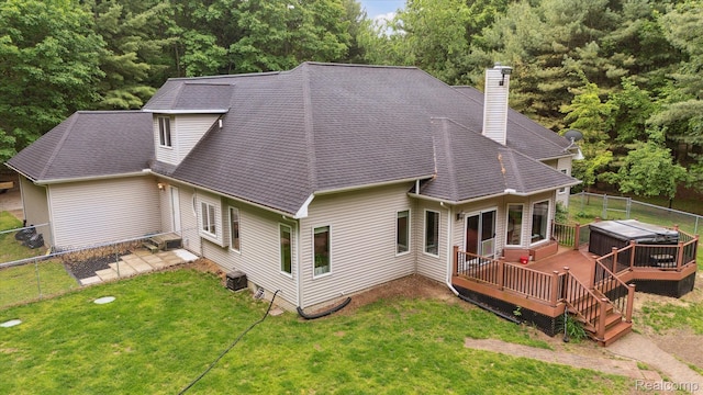 8883 Dixie Hwy, Birch Run, MI 48415 - rear view of property featuring a wooden deck, a fenced backyard, a chimney, and roof with shingles