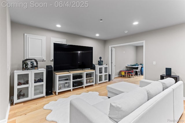 1675 Addison Cir, Walled Lake, MI 48390 - living area featuring wood finished floors, recessed lighting, and baseboards
