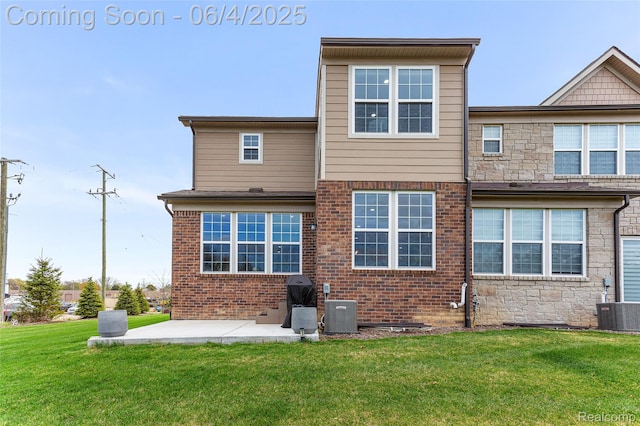 1675 Addison Cir, Walled Lake, MI 48390 - rear view of house featuring a patio area, a lawn, central AC, and brick siding