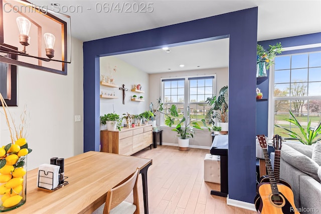 1675 Addison Cir, Walled Lake, MI 48390 - dining area featuring wood finished floors and baseboards