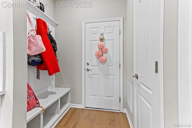 1675 Addison Cir, Walled Lake, MI 48390 - mudroom featuring light wood finished floors and baseboards
