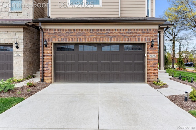 1675 Addison Cir, Walled Lake, MI 48390 - garage featuring driveway